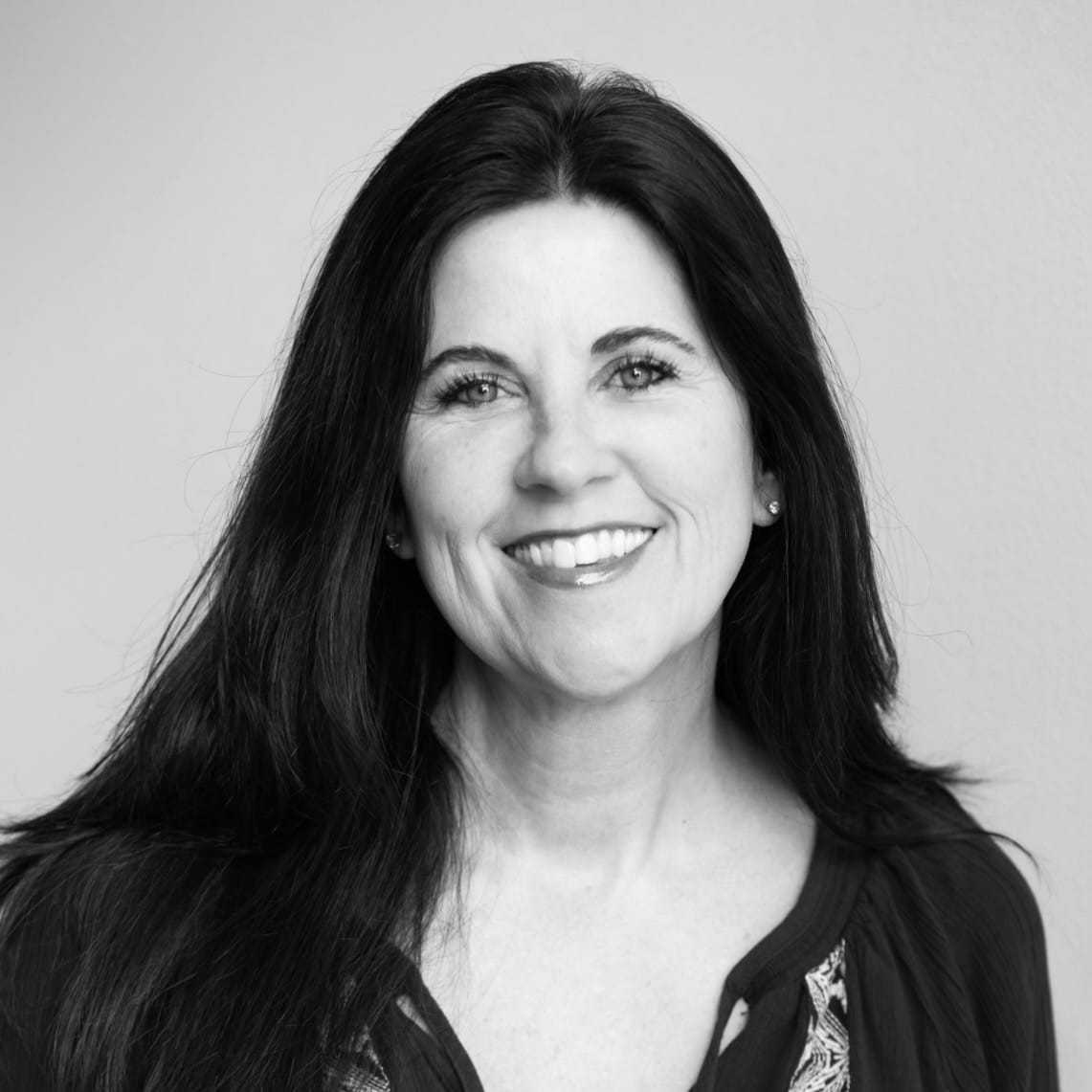 Portrait of Laura Blake, a professional stylist at The Robert Andrew Salon & Spa Collection, showcasing their expertise and style.