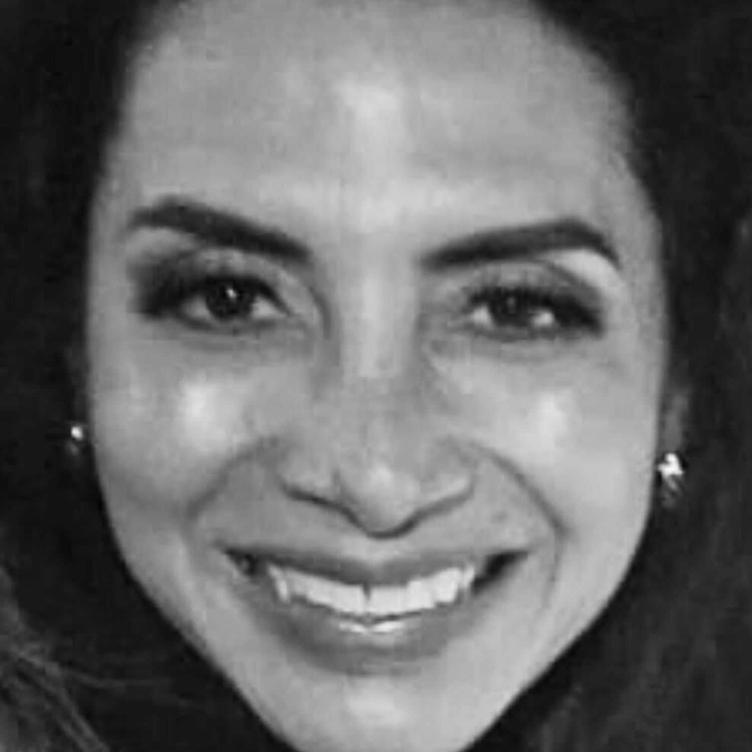 Portrait of Marta, a professional stylist at The Robert Andrew Salon & Spa Collection, showcasing their expertise and style.