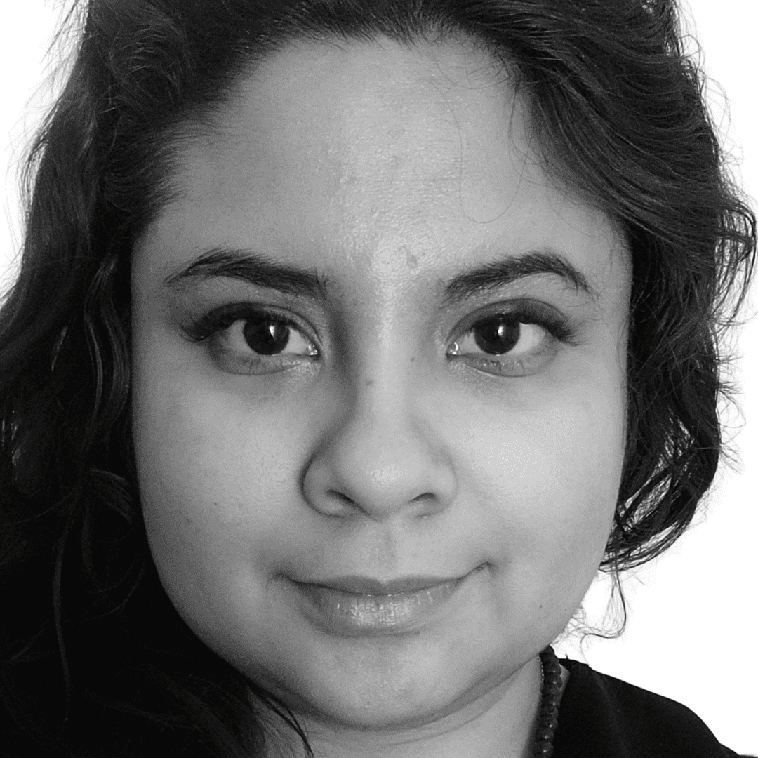 Portrait of Raquel, a professional stylist at The Robert Andrew Salon & Spa Collection, showcasing their expertise and style.