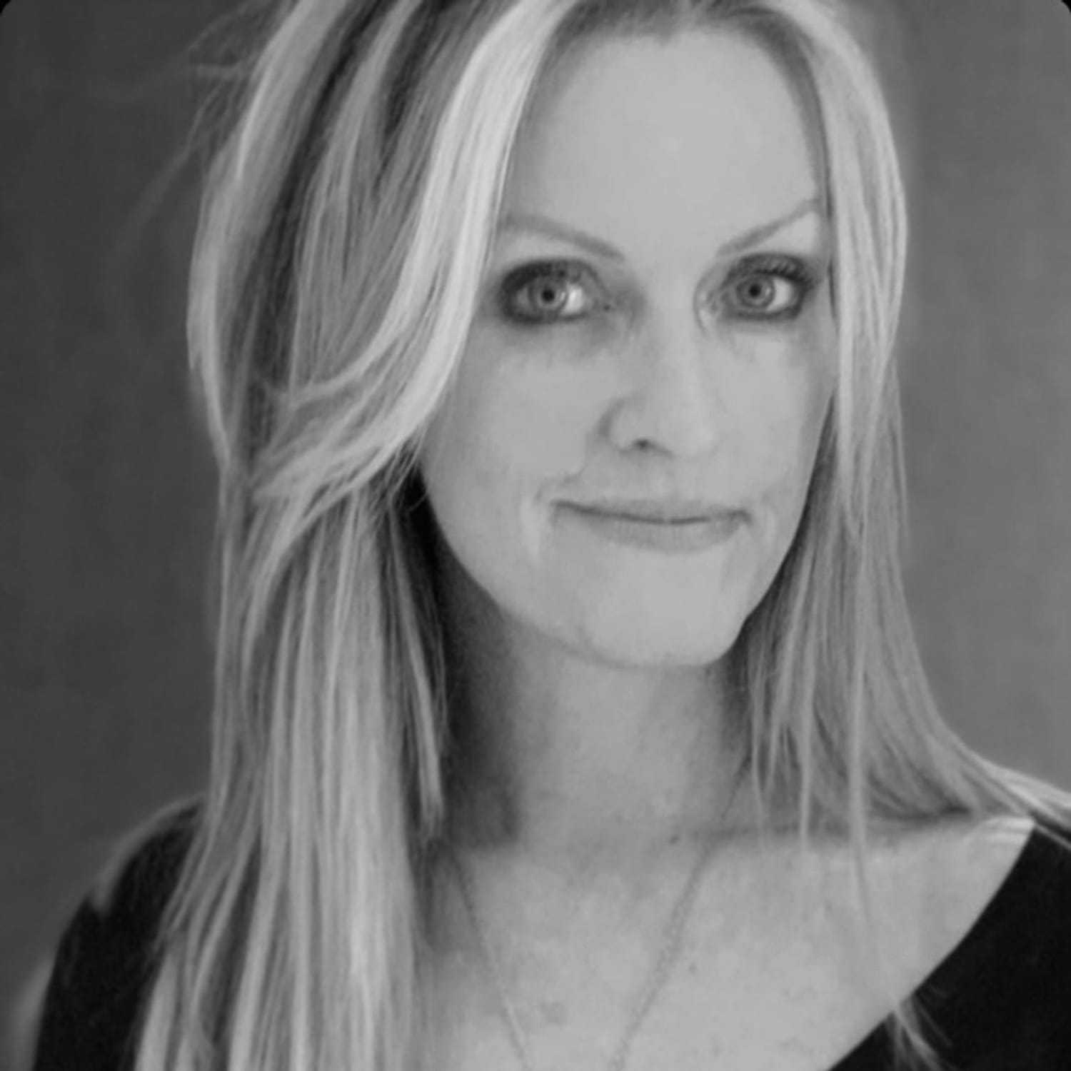 Portrait of Trish Estrada, a professional stylist at The Robert Andrew Salon & Spa Collection, showcasing their expertise and style.