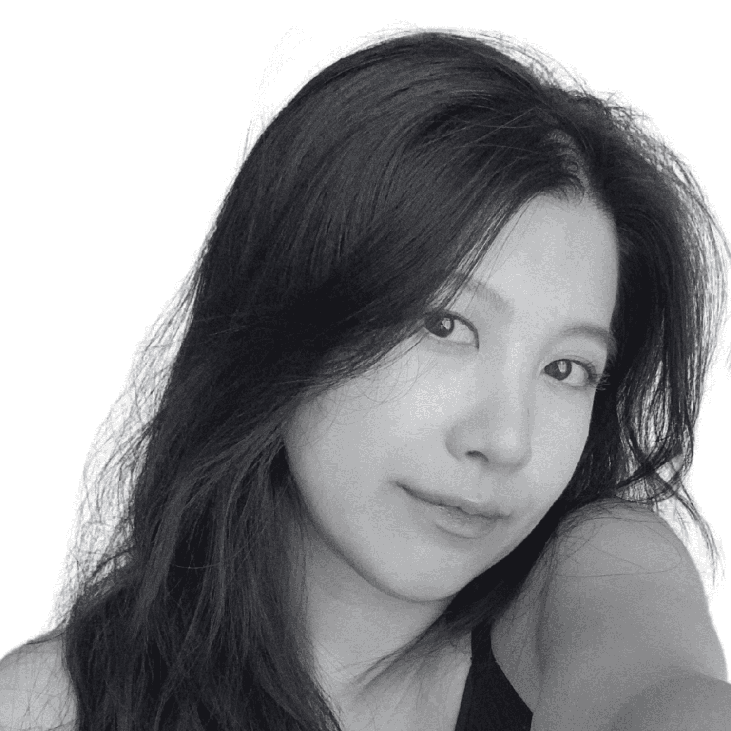 Portrait of Tammi, a professional stylist at The Robert Andrew Salon & Spa Collection, showcasing their expertise and style.