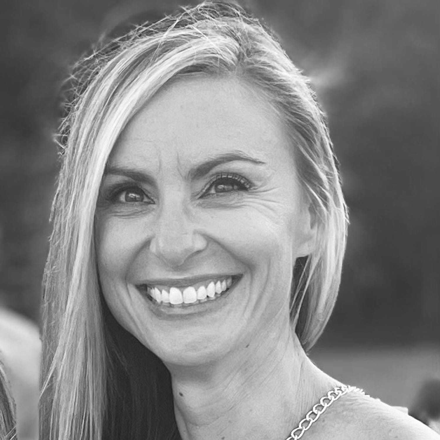 Portrait of Mandy, a professional stylist at The Robert Andrew Salon & Spa Collection, showcasing their expertise and style.