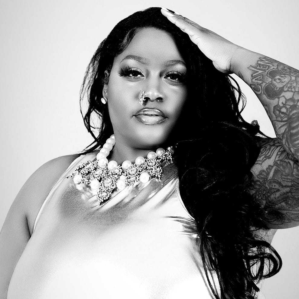 Portrait of Lanay, a professional stylist at The Robert Andrew Salon & Spa Collection, showcasing their expertise and style.