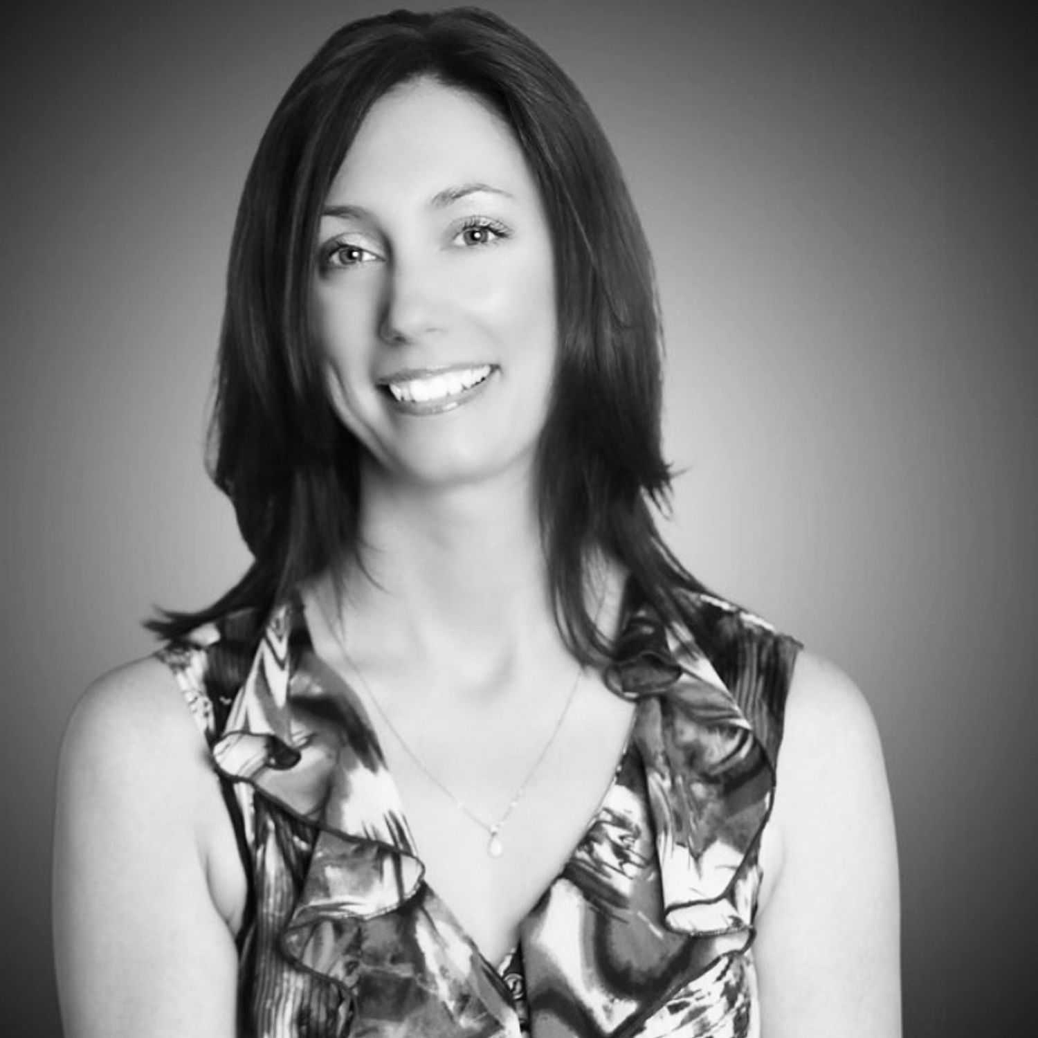 Portrait of Amanda, a professional stylist at The Robert Andrew Salon & Spa Collection, showcasing their expertise and style.
